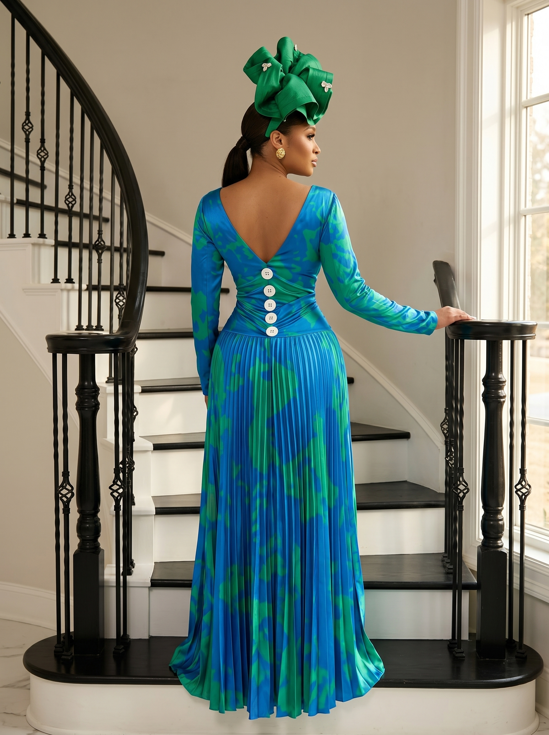 The Aura Statement Pleated Gown