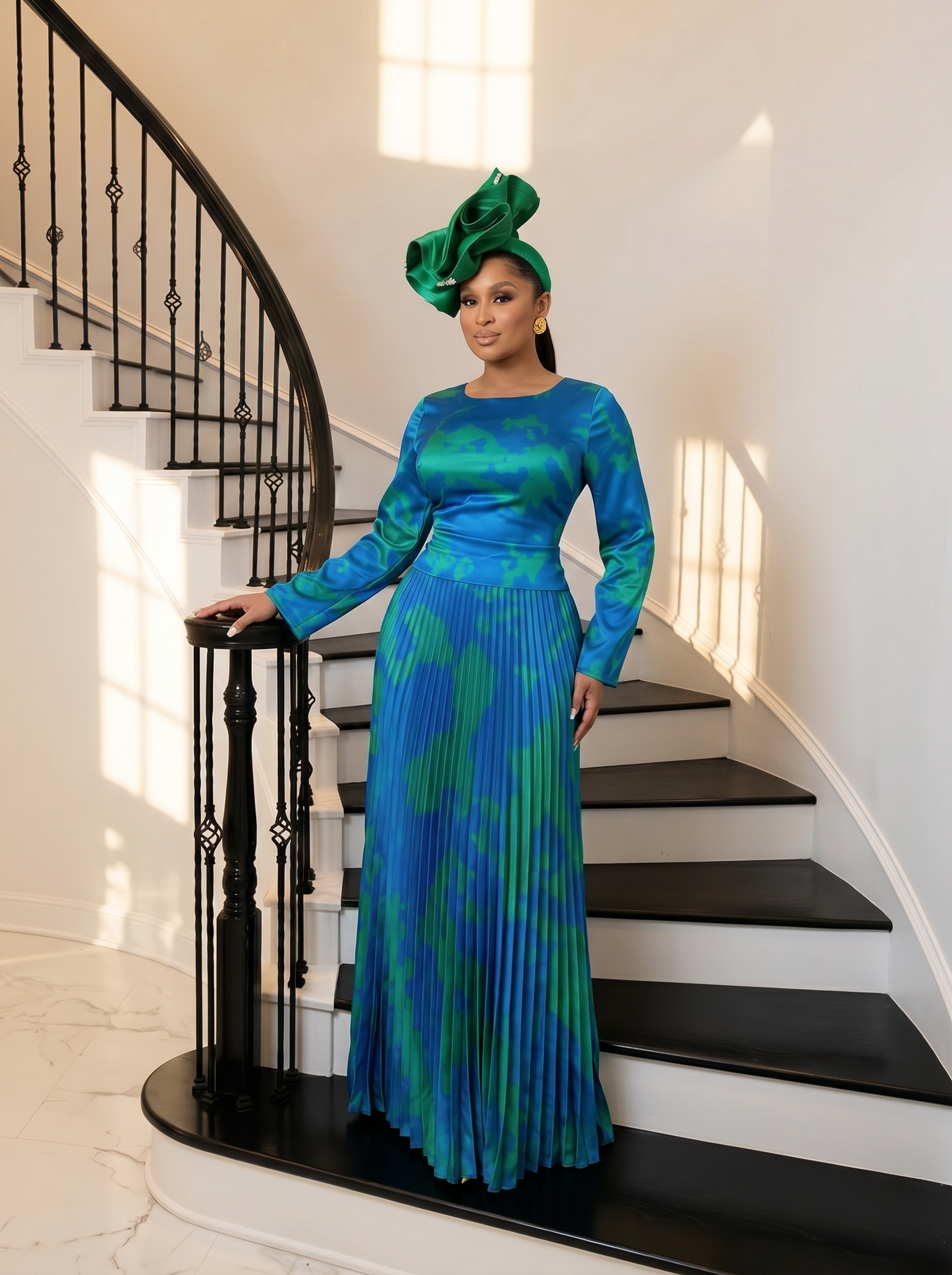 The Aura Statement Pleated Gown