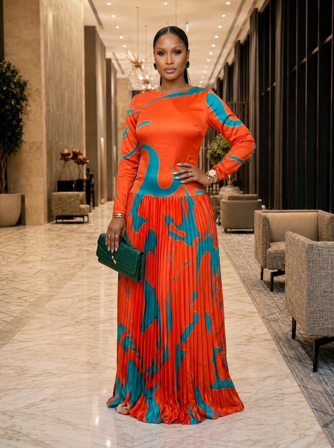 The Aura Statement Pleated Gown