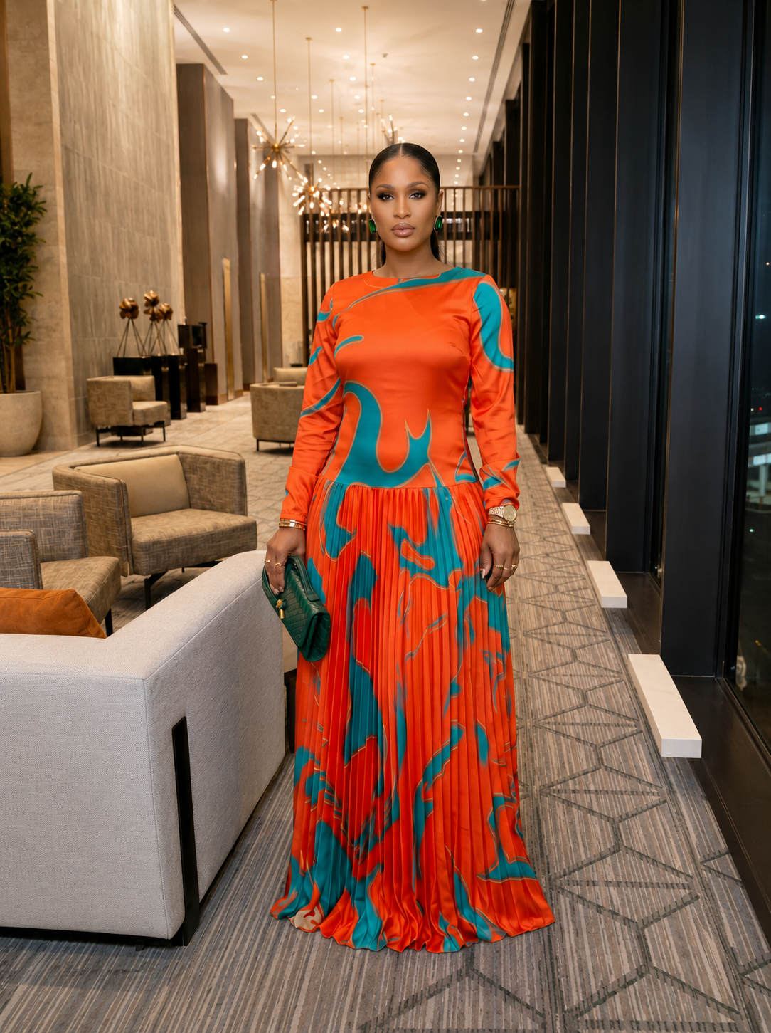 The Aura Statement Pleated Gown